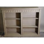 A late Victorian grey painted floor standing open bookcase, 164cm wide x 125cm high.