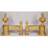 A pair of French ormolu chenets, Louis XVI style, late 19th century,
