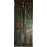 A pair of early 20th century French green painted pine floor standing shutter doors,