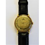 An Omega Automatic gold circular cased gentleman's wristwatch,