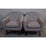A pair of 20th century hardwood framed tub chairs with grey button back upholstery on tapering