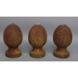 A set of three cast iron pineapple pier finials, 47cm high, (3).