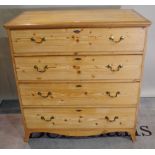A George III pine chest of four long graduated drawers on splayed bracket feet,
