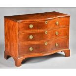 A George III featherbanded mahogany serpentine chest of three long graduated drawers on bracket