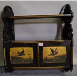 A Victorian aesthetic movement two tier hanging cupboard with fret cut decoration,