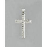An 18ct white gold and diamond pendant cross, channel set with brilliant cut diamonds,