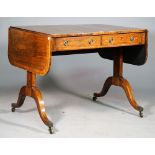 A late George III satinwood banded rosewood sofa table,