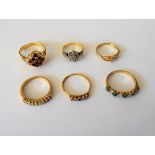 A gold and diamond set nine stone cluster ring, a gold and diamond set half hoop ring,