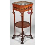 A late 19th century mahogany vitrine table with lift glazed octagonal top and sides on four square