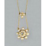 A gold, diamond and half pearl set pendant necklace, circa 1900,