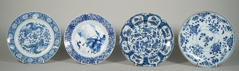 Four Chinese blue and white plates, 18th century, one painted with a hunting scene,