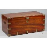 A Chinese export brass-bound camphor wood rectangular trunk with loop side handles,