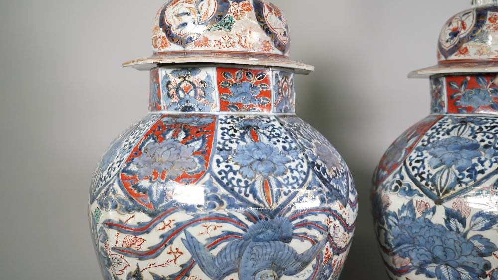 A large pair of Japanese Arita octagonal vases and covers, Edo period, circa 1700, - Image 5 of 8