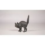 An Austrian cold-painted bronze cat, early 20th century, modelled in an aggresive standing pose,
