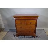 A 20th century mahogany chest of two short and two long drawers, 92cm wide 96cm high.