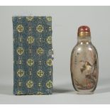 A Chinese inside painted rock crystal snuff bottle, painted on one side with two pheasants,