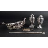 A pair of George III style vase shape silver pepperettes, George Unite, Birmingham 1876, 9.