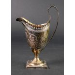 A George III silver helmet cream jug, London 1791, makers mark unclear, with punched rim,