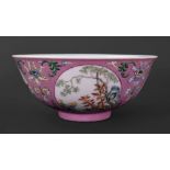 A Chinese pink sgraffito ground famille rose medallion bowl, blue Daoguang seal mark,