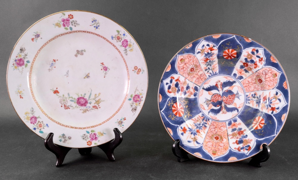 A Chinese Export famille rose plate, Qianlong, painted with scattered flowers, an insect and bird,