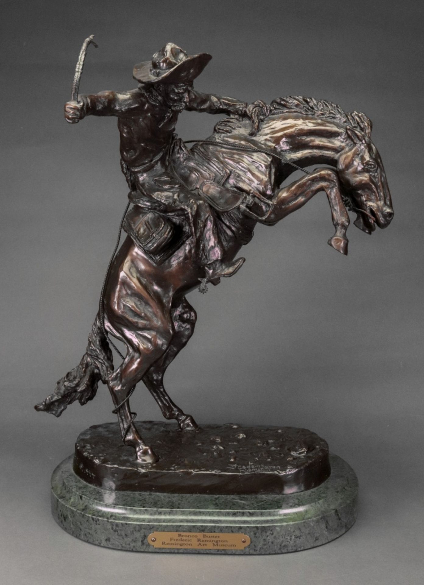 After Frederick Remington, Bronco Buster, bears inscription and date 'E M I 1994',