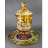 A Bohemian amber-stained glass punch bowl, cover and stand, mid 19th century, the domed cover,