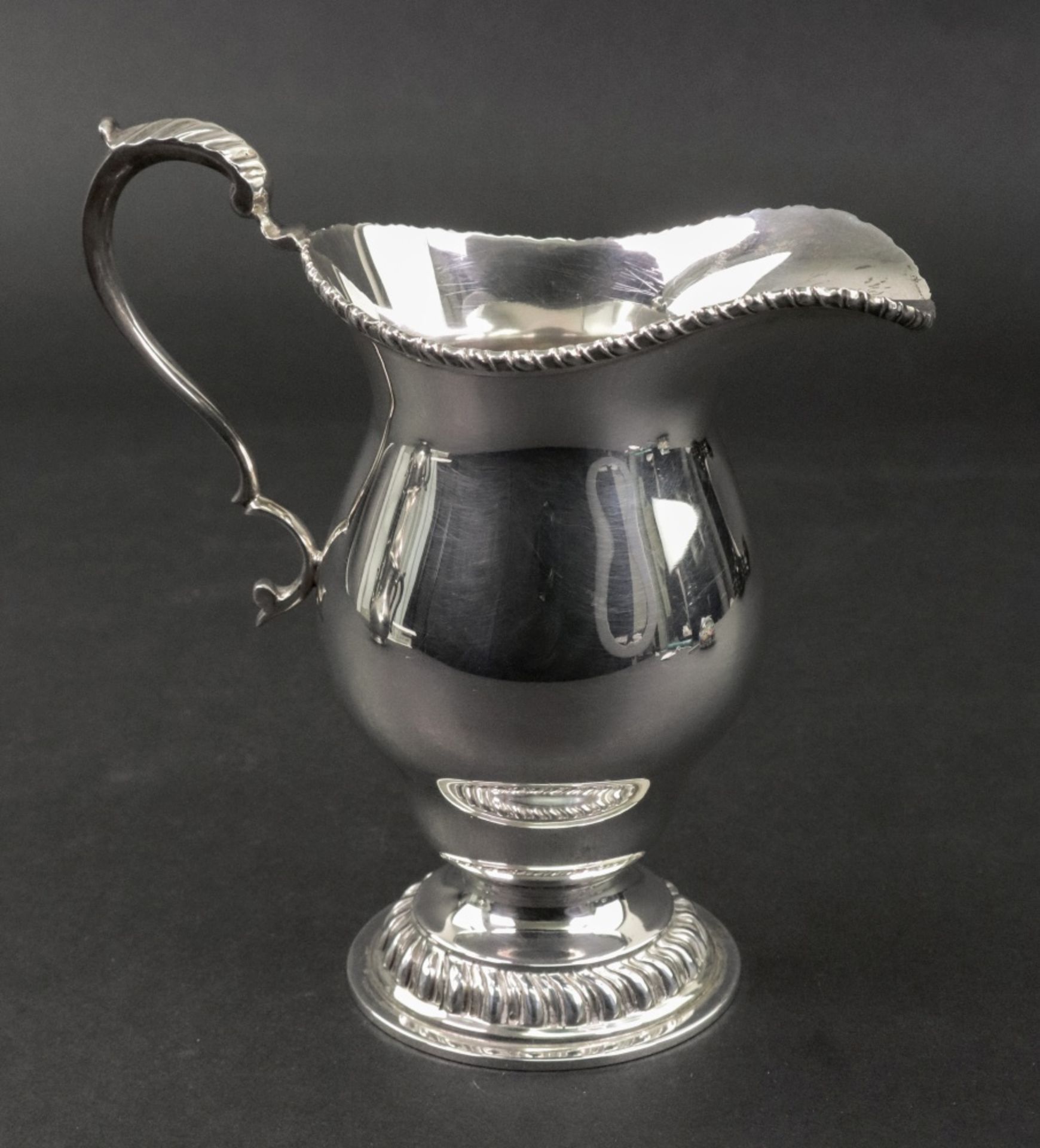 A large George III style silver ogee shape cream jug, London 1973, makers mark B.S. - Image 2 of 2