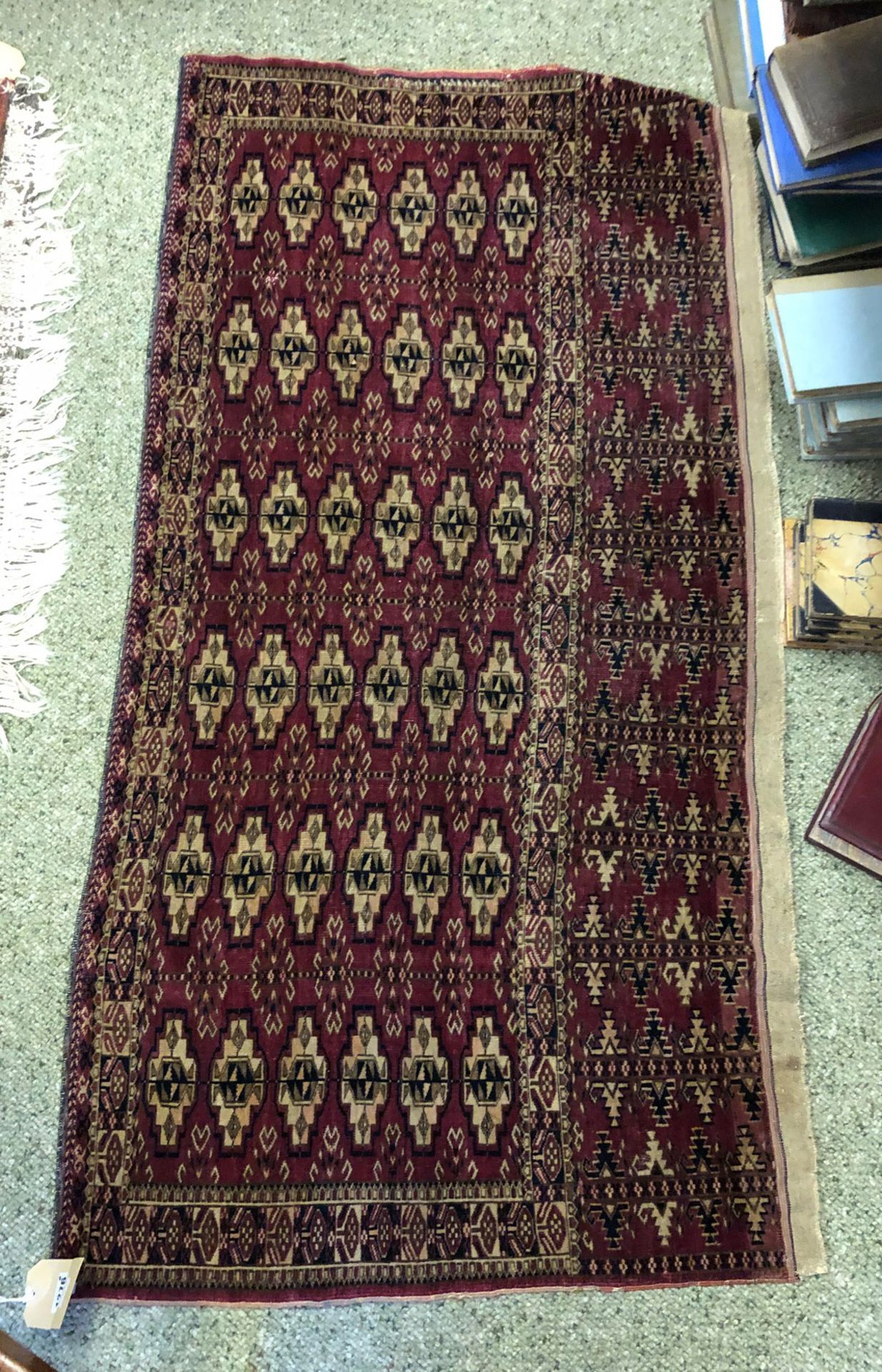 A Yomut Juval rug, with six rows of guls, on a crimson ground, 133 x 67cm. - Image 2 of 7