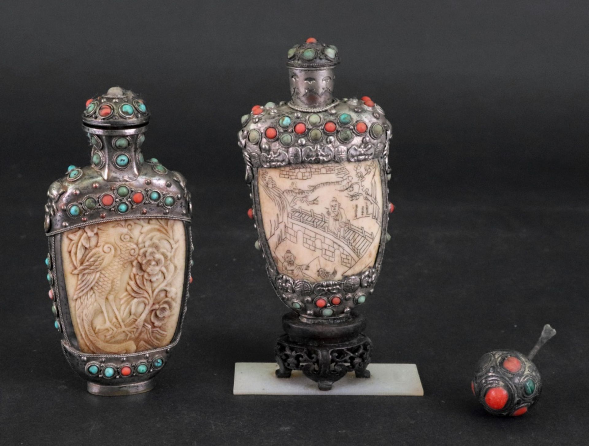 Two Chinese ivory snuff bottles, with white metal and 'jewelled' mounts, late 19th/20th century,