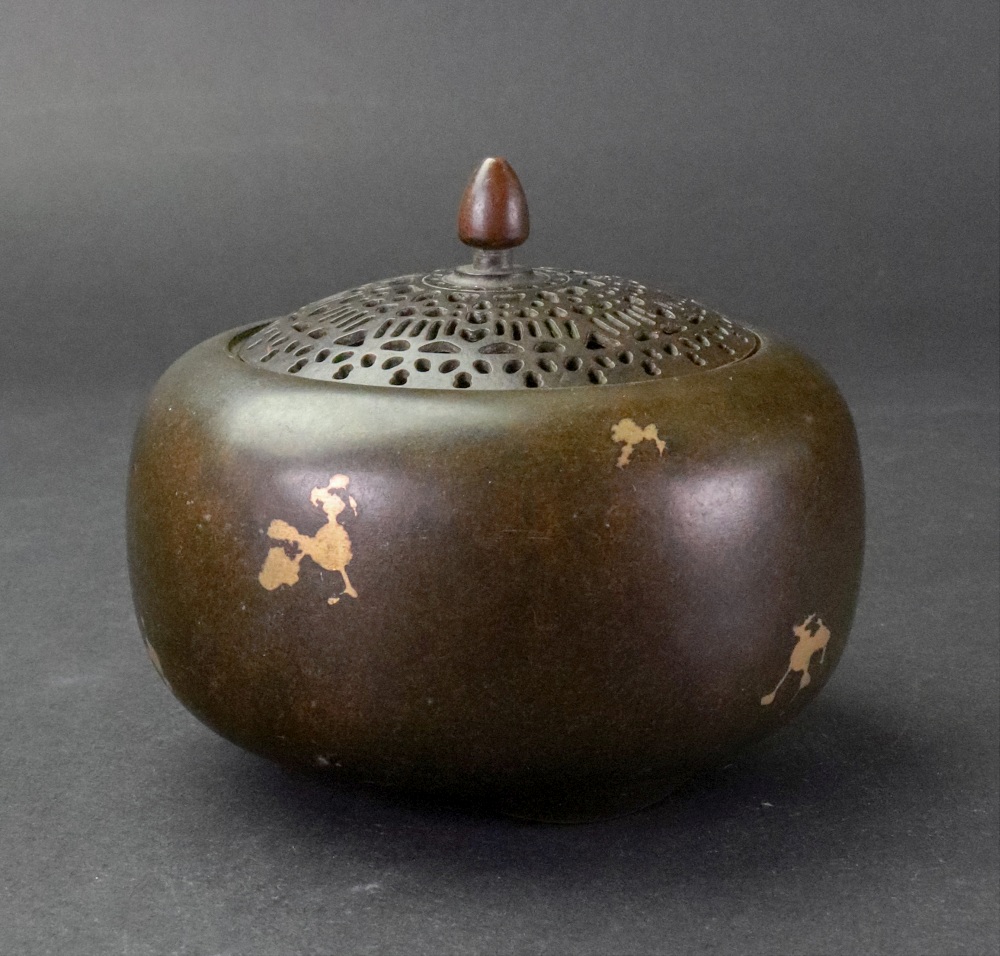 A Chinese bronze gilt splashed censer and pierced cover, six-character Xuande mark but later,