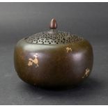 A Chinese bronze gilt splashed censer and pierced cover, six-character Xuande mark but later,