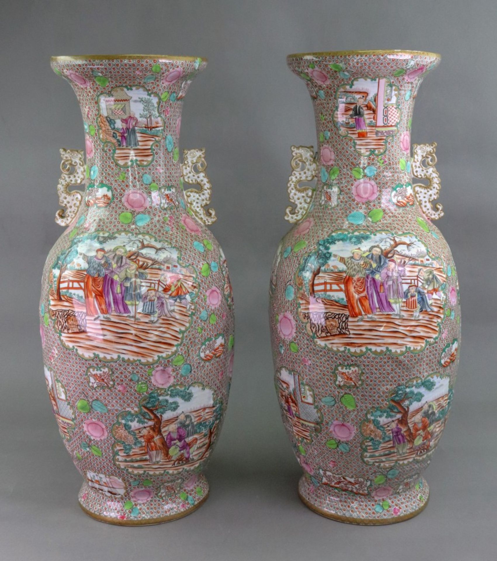An unusual and large pair of Staffordshire earthenware two handled baluster vases,