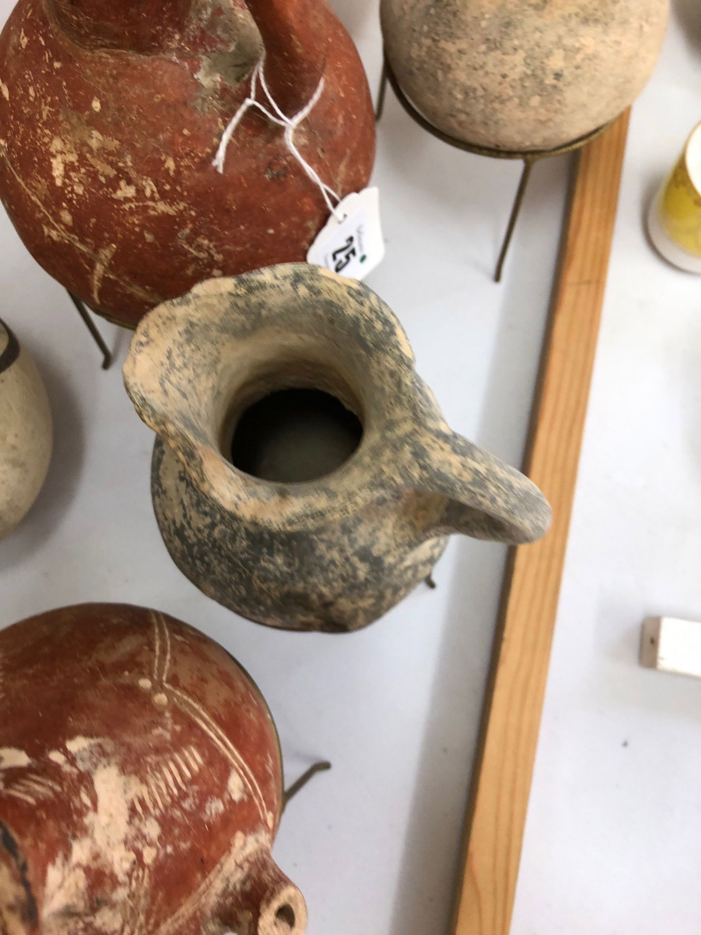 A group of pottery, thought to be Cypriot, to include 8 pouring vessels, - Image 3 of 14