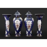 A Chinese blue ground famille rose garniture of vases, 19th century,