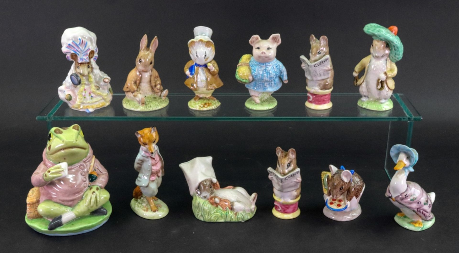 A group of eight Beswick Beatrix Potter figures; Little Pig Robinson, 1989; Amiable Guinea-Pig,