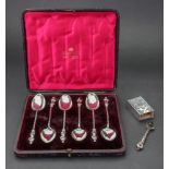 A cased set of six Victorian silver 'apostle' teaspoons, Birmingham 1891,