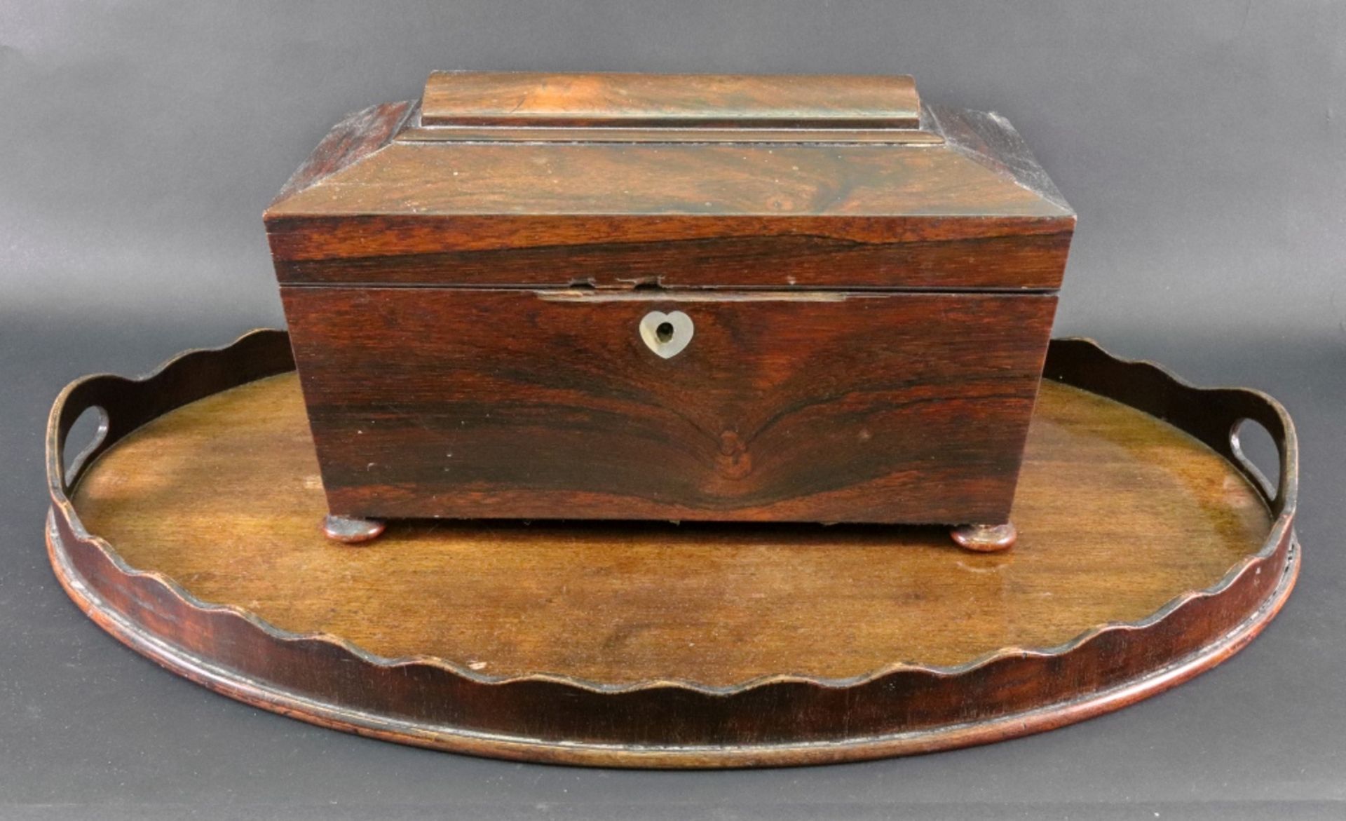 A William IV rosewood sarcophagus shape tea caddy,