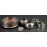 Two pairs of silver napkin rings, one pair, Chester 1922, the others, Birmingham 1942,