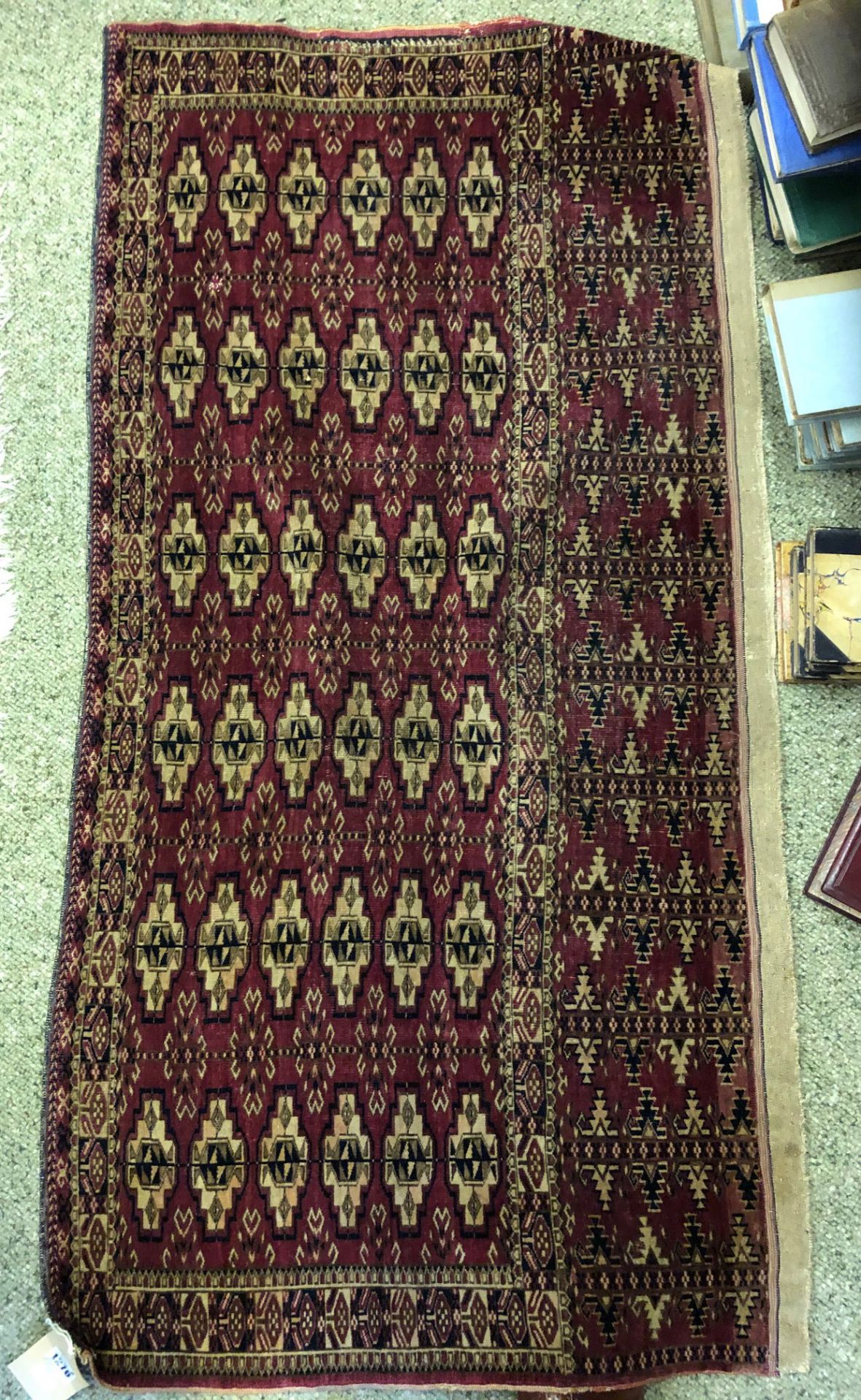 A Yomut Juval rug, with six rows of guls, on a crimson ground, 133 x 67cm. - Image 4 of 7