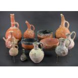 A group of pottery, thought to be Cypriot, to include 8 pouring vessels,