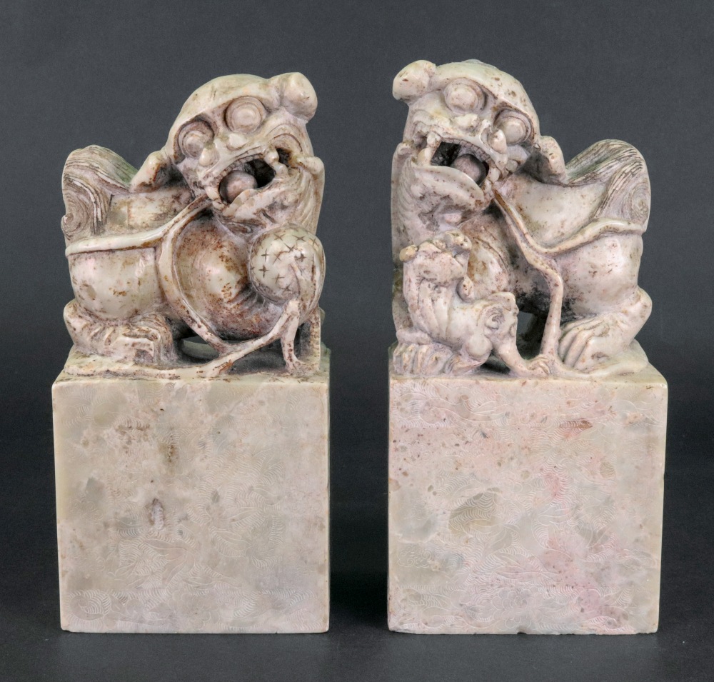 A pair of Chinese soapstone groups of Buddhist lions, the male with a brocade ball, - Image 2 of 6