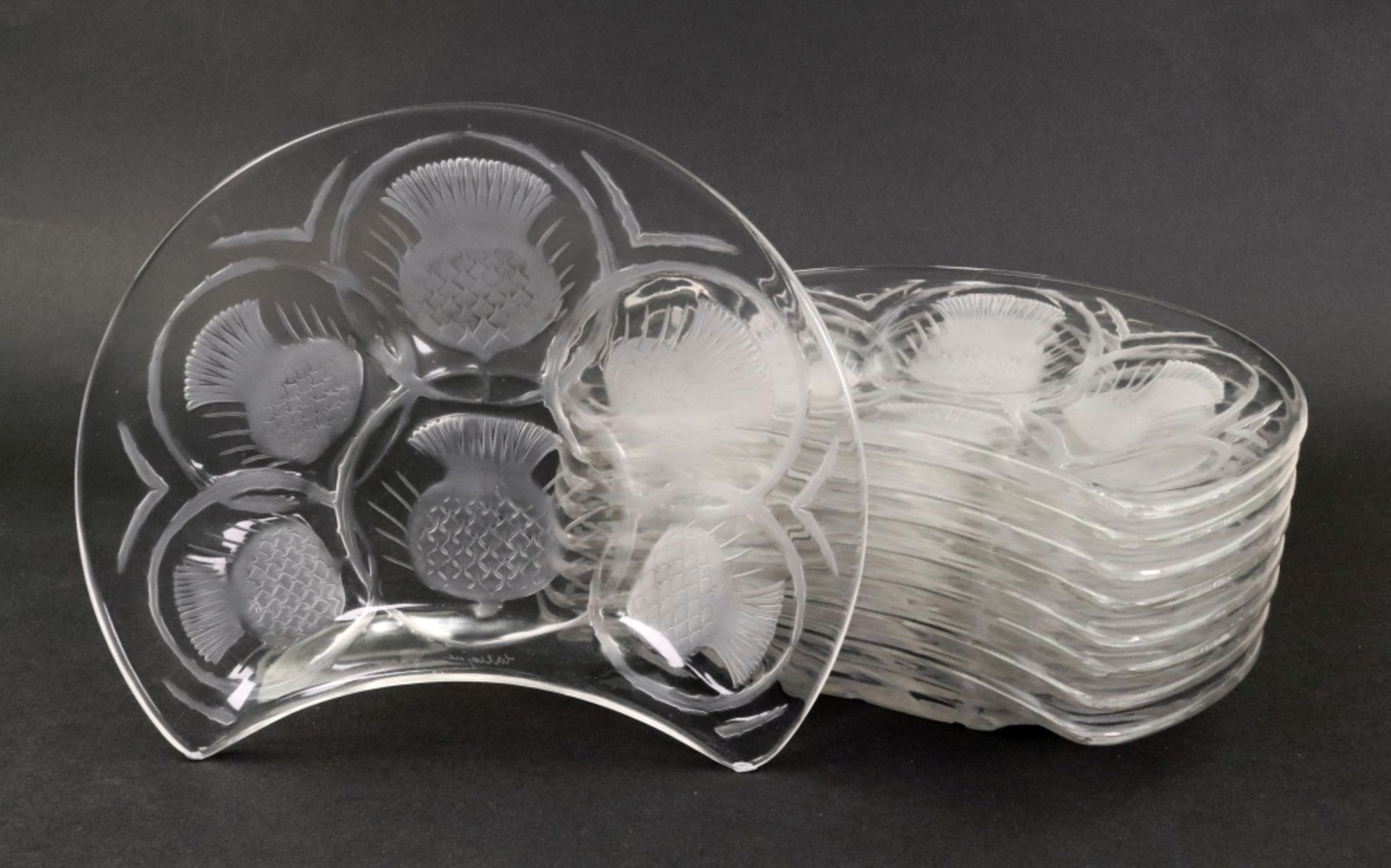 Lalique; a set of nine glass kidney shape salad plates, decorated with thistles, - Image 3 of 3