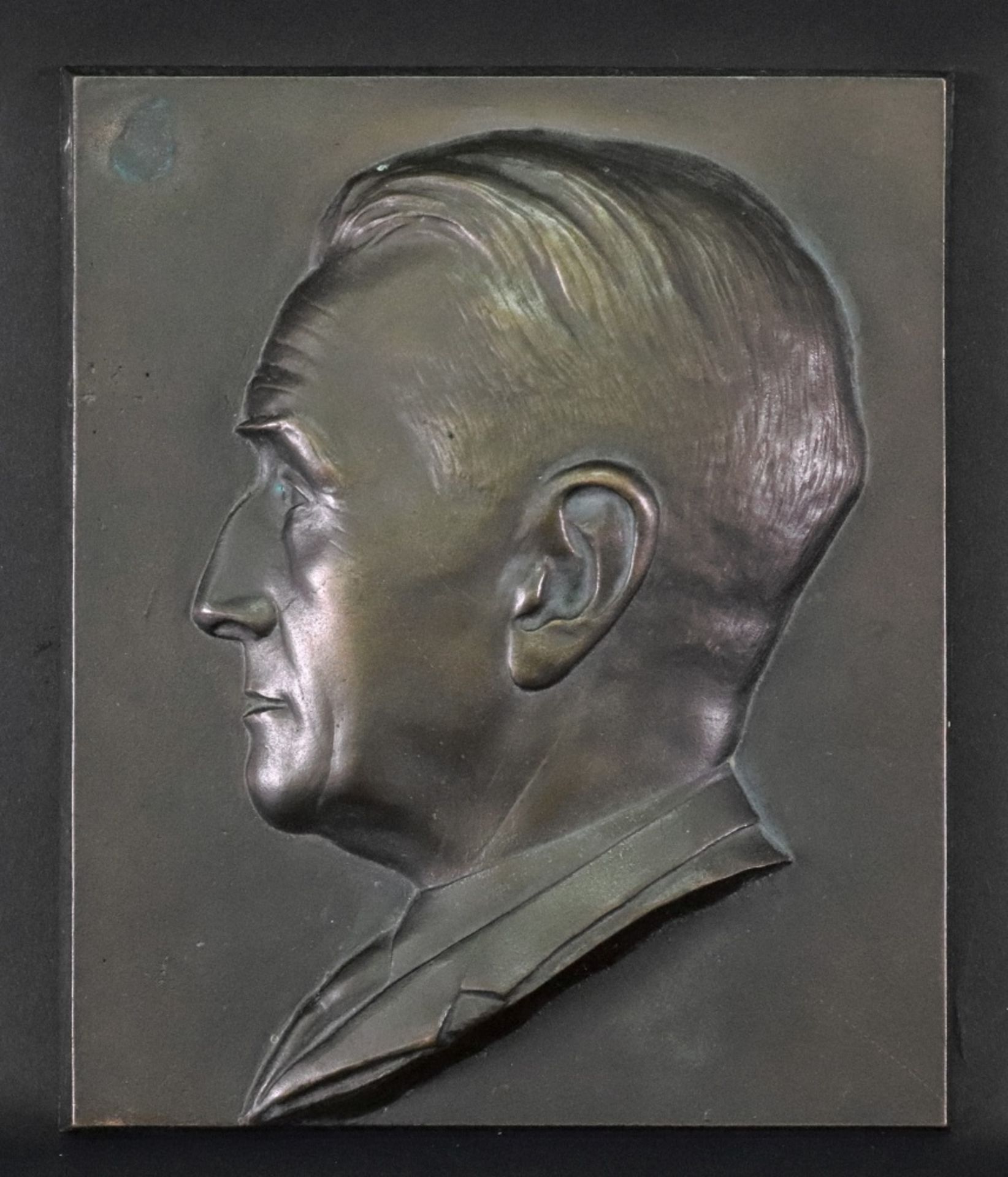 A 20th Century portrait profile bust facing to sinister, possibly Franklin D Roosevelt,