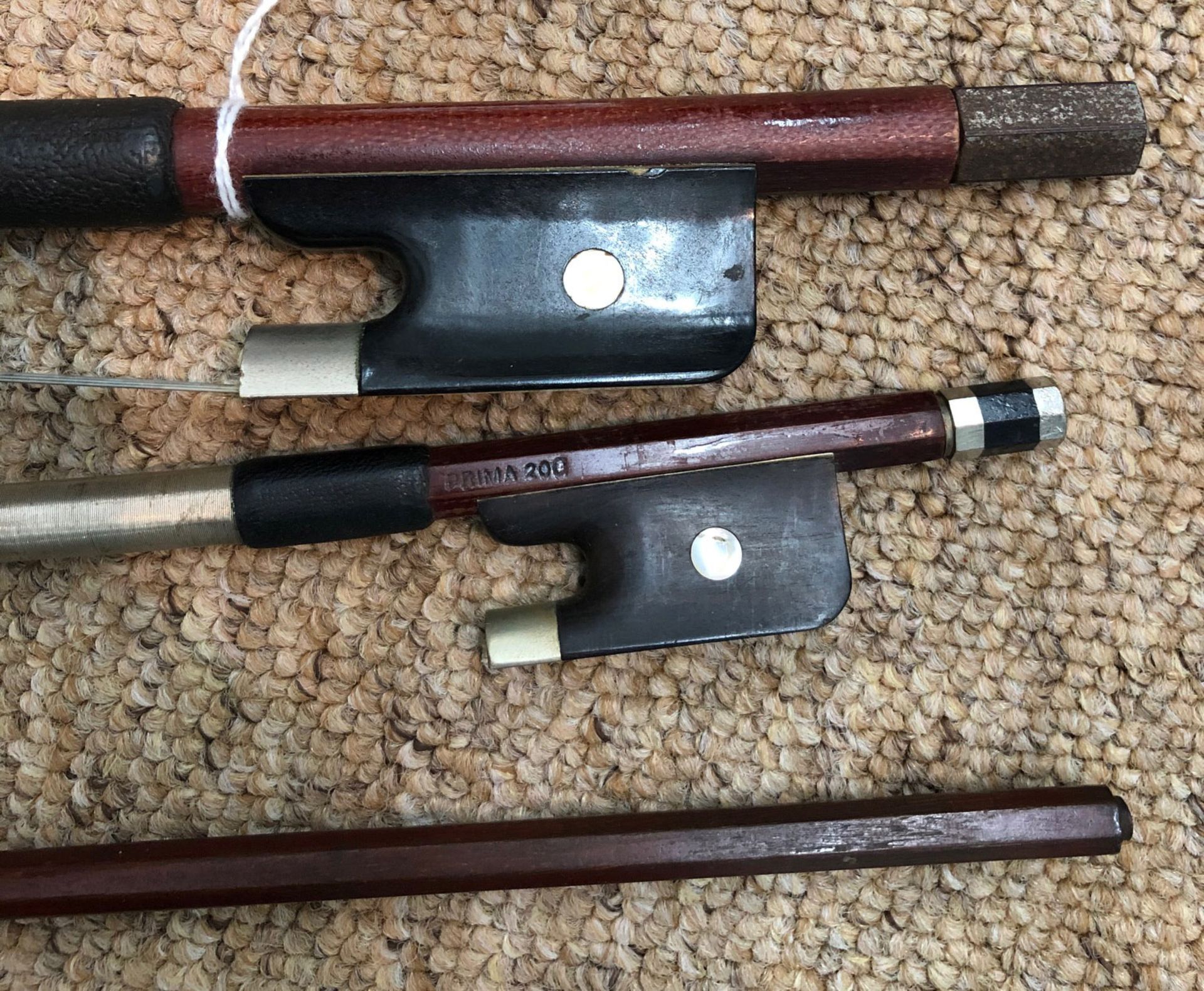 Three Violin bows, one mahogany and ebony, stamped Prima 200, with bone, - Image 4 of 7