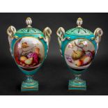 A pair of Royal Worcester two handled pot pourri vases and pierced covers, circa 1865,