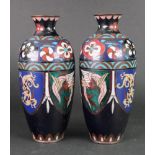 A pair of cloisonne vases, circa 1900, of slender ovoid form,