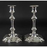 A pair of George II style silver candlesticks, William Hutton & Sons, London 1909,