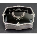 A shaped rectangular silver jewel casket, Mappin & Webb, Birmingham 1913,