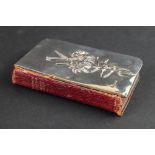 An Edwardian silver mounted book of Common Prayer and Hymns, William Comyns, London 1905, 12 x 8cm.