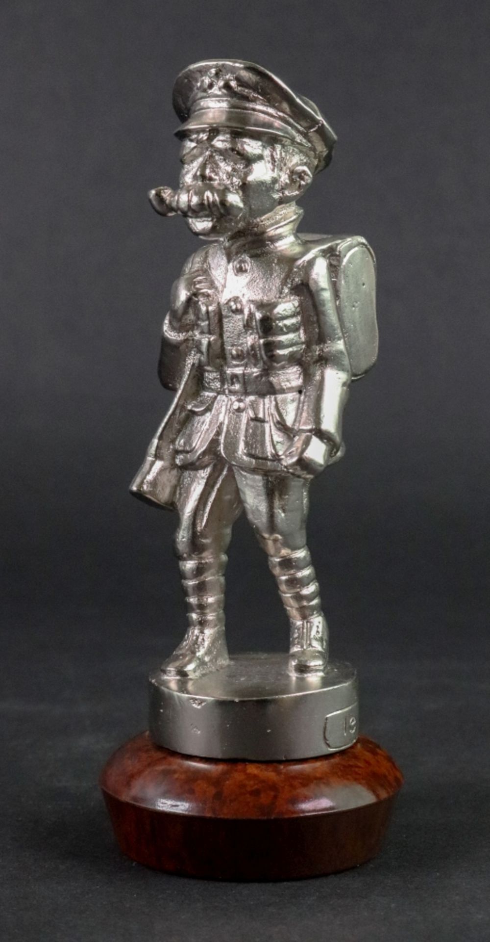 A silvered figure of a British military officer, 'Old Bill', detailed 'IE D370' to base, 12.
